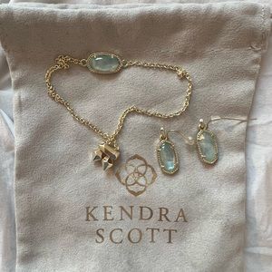 Kendra Scott matching set gold with aquamarine bracelet and earrings